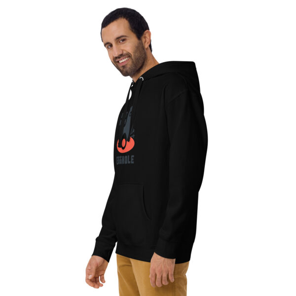 A man wearing a black hoodie with an orange and red design on it.