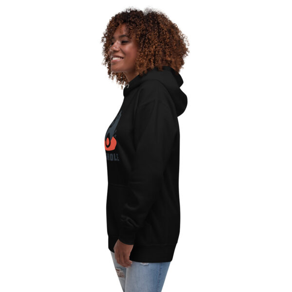 A woman wearing a black hoodie with an orange and red logo.