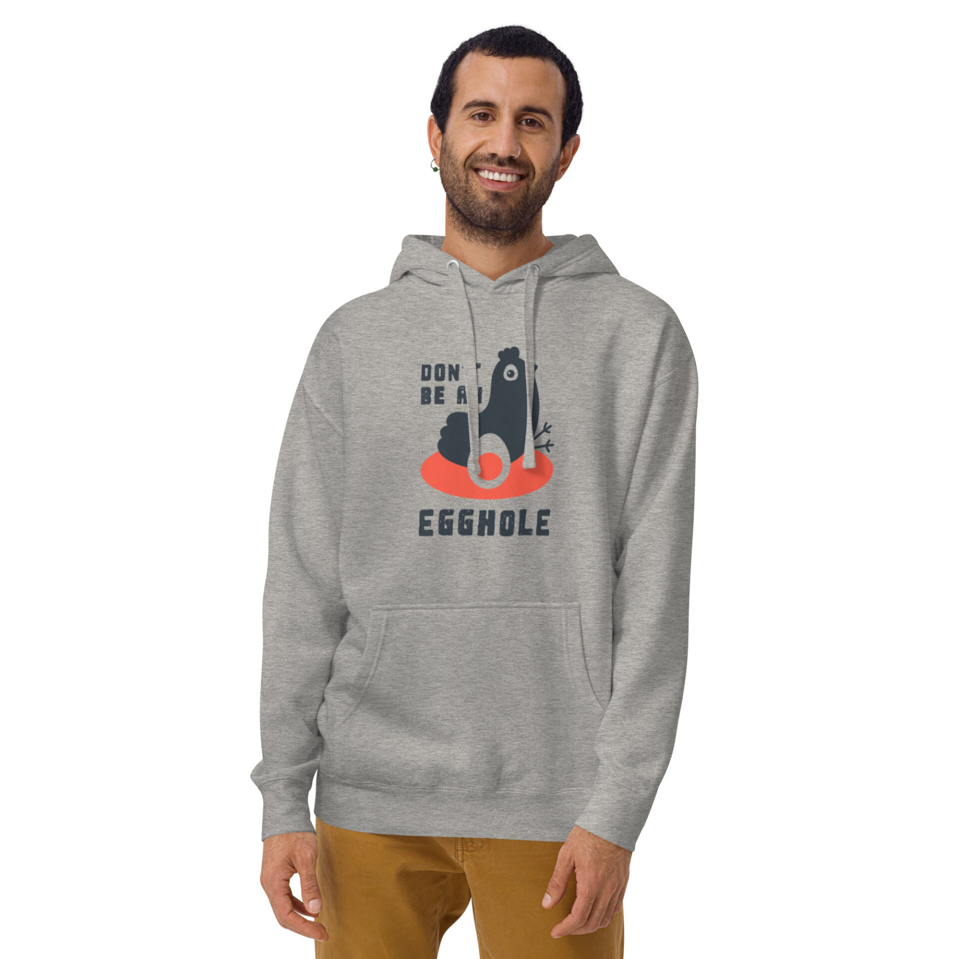 A man wearing an ash colored hoodie with the words " you are a chruple ".