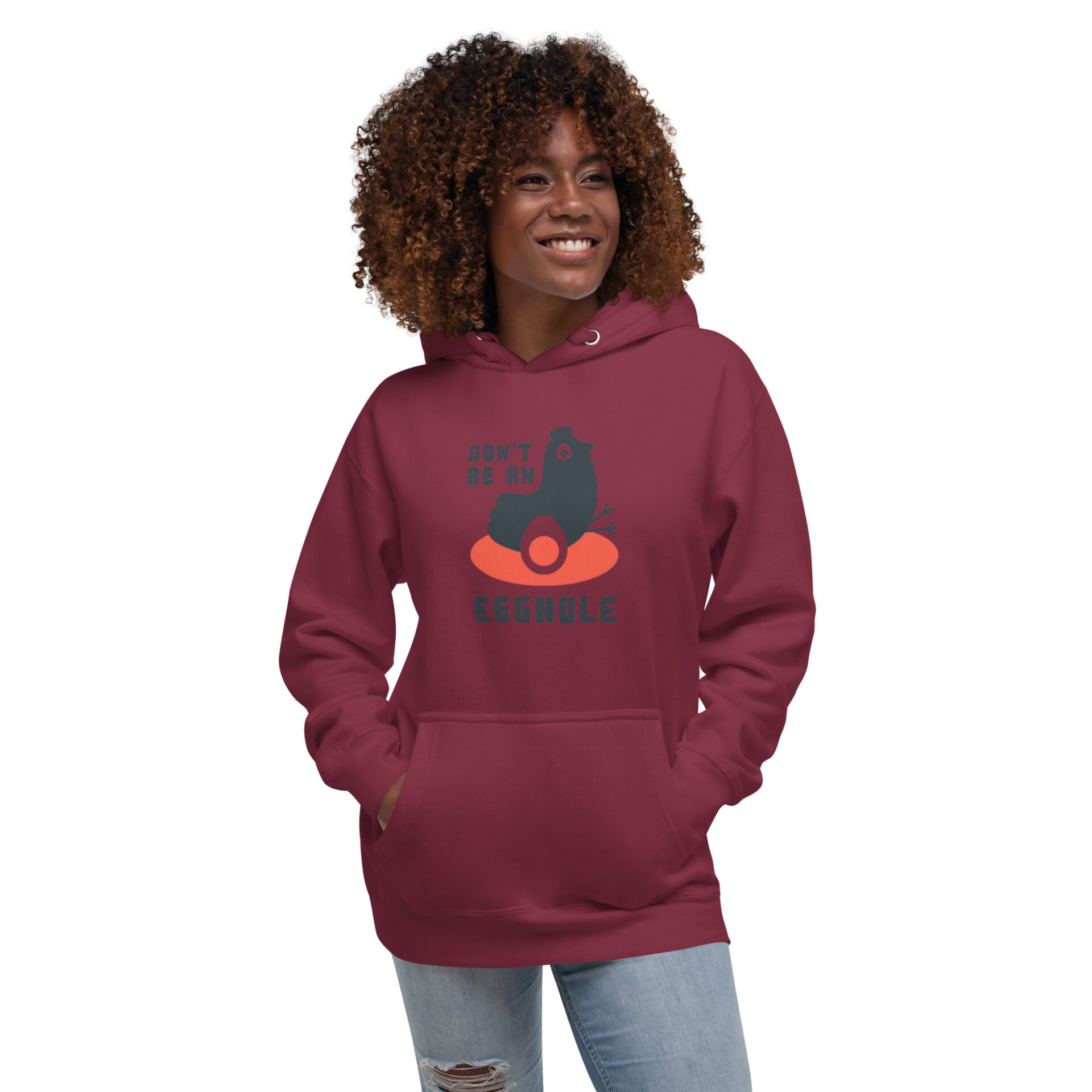 A woman is wearing a hoodie with an image of a cat.