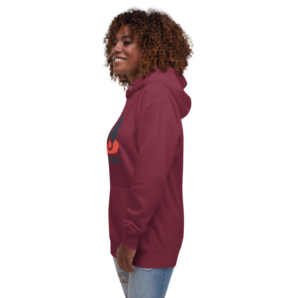 A woman wearing a red hoodie with an orange heart on it.