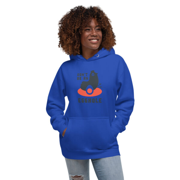 A woman in blue hoodie with a cat on it.