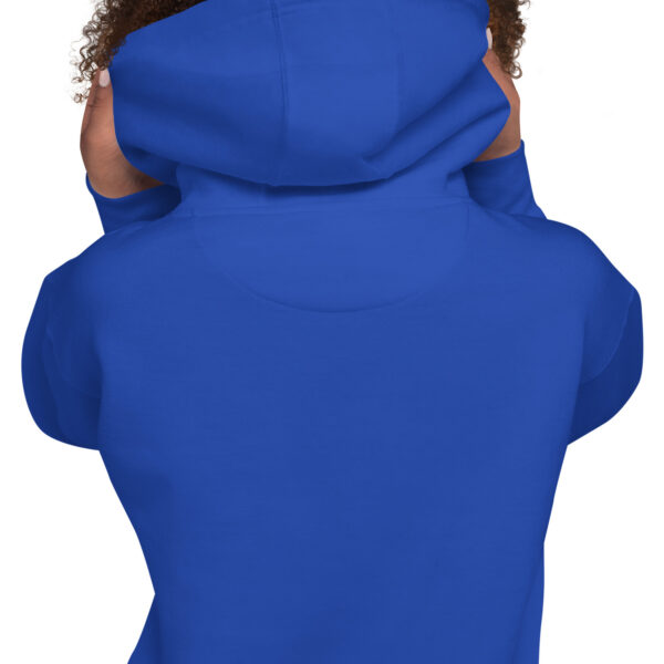 A person wearing a blue hoodie with a cat on it.