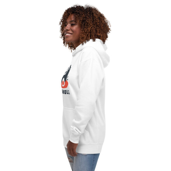 A woman wearing a white hoodie with an image of a person.