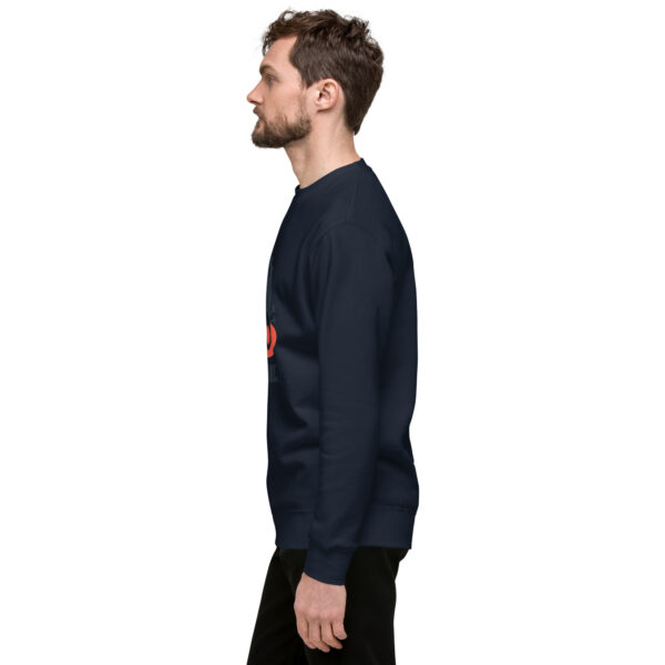 A man in black sweatshirt with red logo