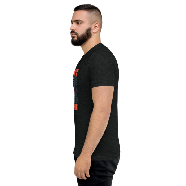 A man with a beard is wearing a black shirt