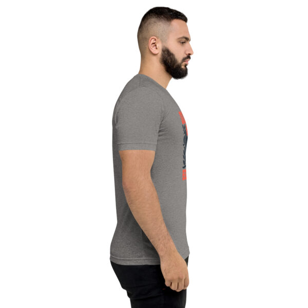 A man with a beard is wearing a t-shirt