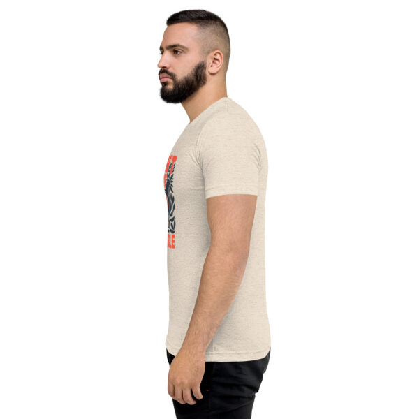 A man with a beard is wearing a t-shirt