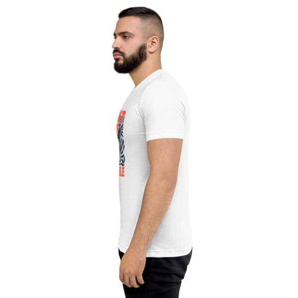 A man with a beard is wearing a white t-shirt