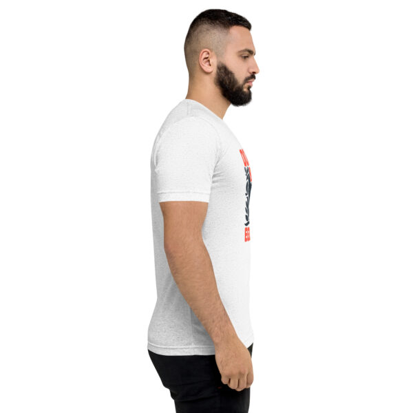 A man with a beard is wearing a white t-shirt