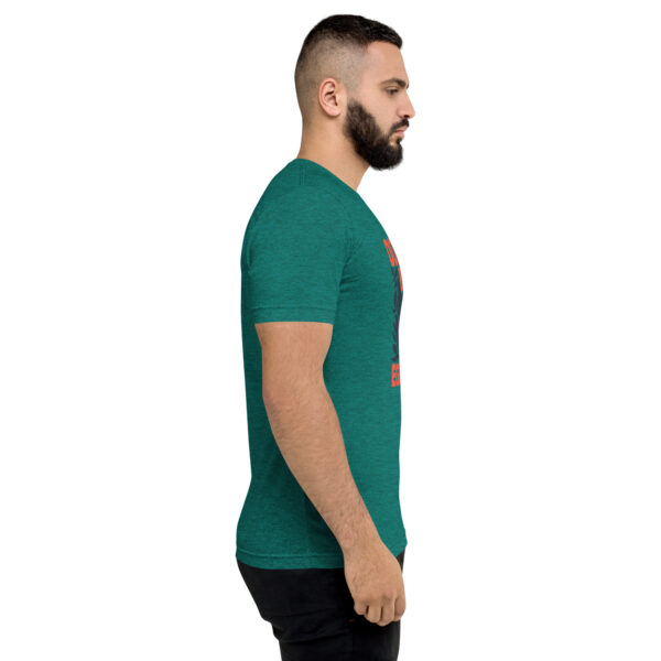 A man with a beard is wearing a t-shirt