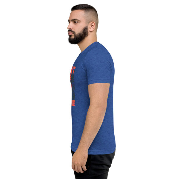 A man with a beard is wearing a blue shirt