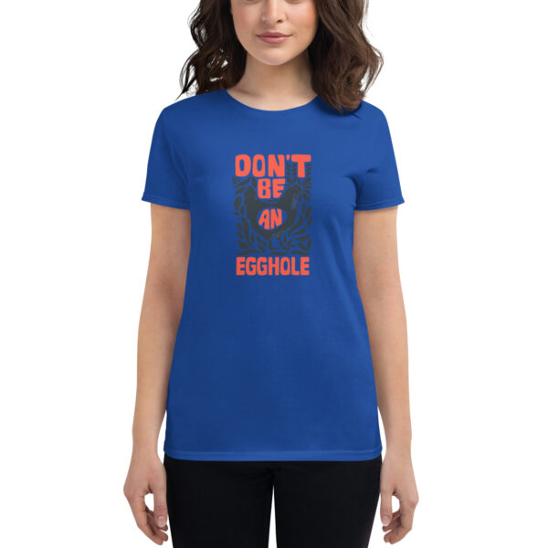 A woman is wearing a blue t-shirt with the words " don 't be equitable ".