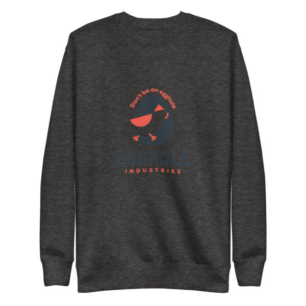 A dark colored sweatshirt with an image of a bird.