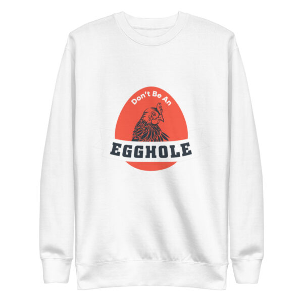 A white sweatshirt with an egg hole logo on it.