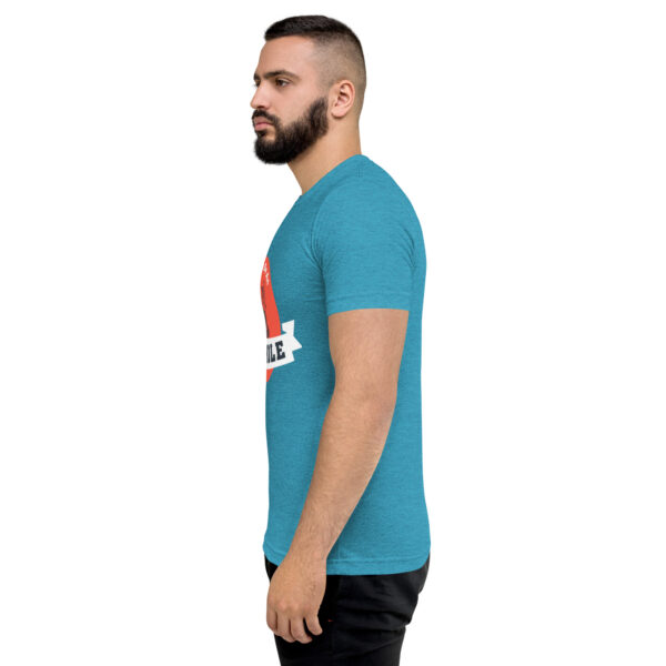 A man with a beard is wearing a blue t-shirt