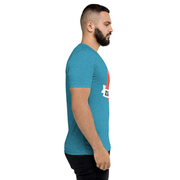 A man with a beard is wearing a blue t-shirt