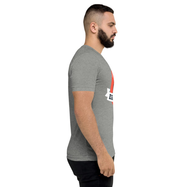 A man with a beard is wearing a t-shirt