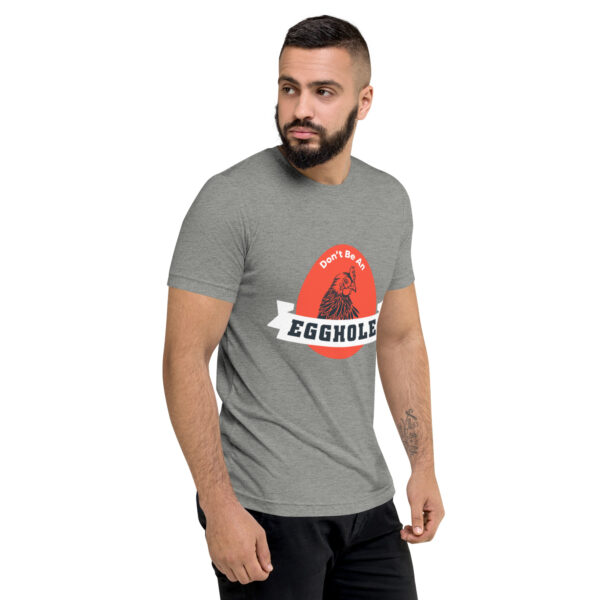 A man wearing a t-shirt with the words equuleus on it.