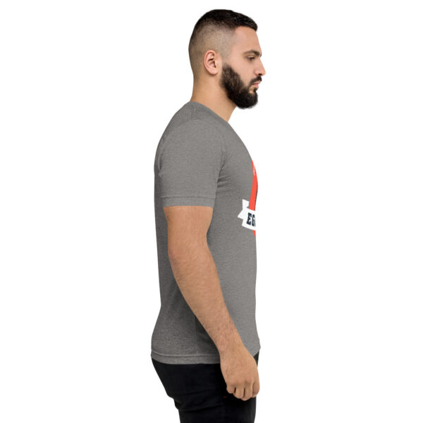 A man with a beard is wearing a t-shirt