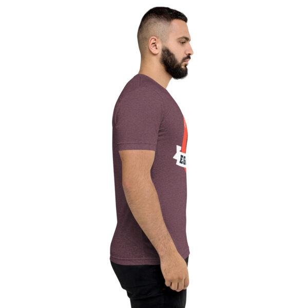 A man with a beard is wearing a t-shirt