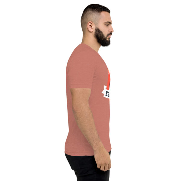 A man with a beard is wearing a t-shirt