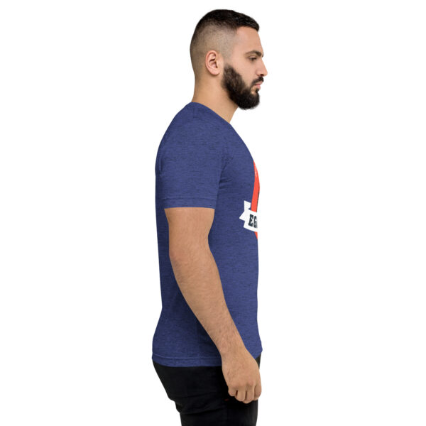 A man with a beard is wearing a t-shirt