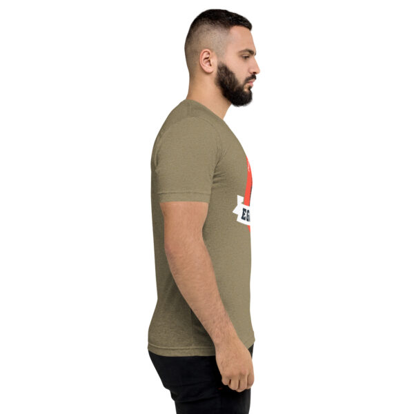 A man with a beard is wearing a t-shirt