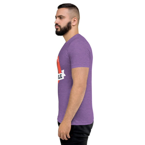 A man with a beard is wearing purple t-shirt