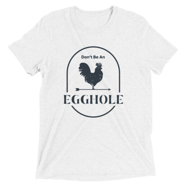 A white t-shirt with an egg hole design on it.