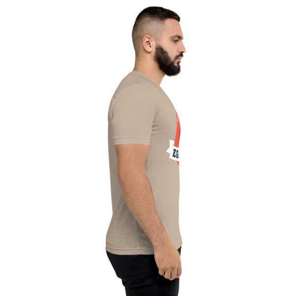 A man with a beard is wearing a t-shirt