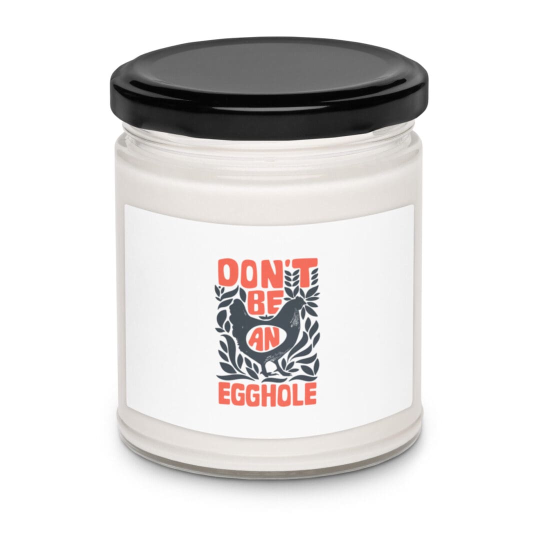 White candle jar with a humorous label.