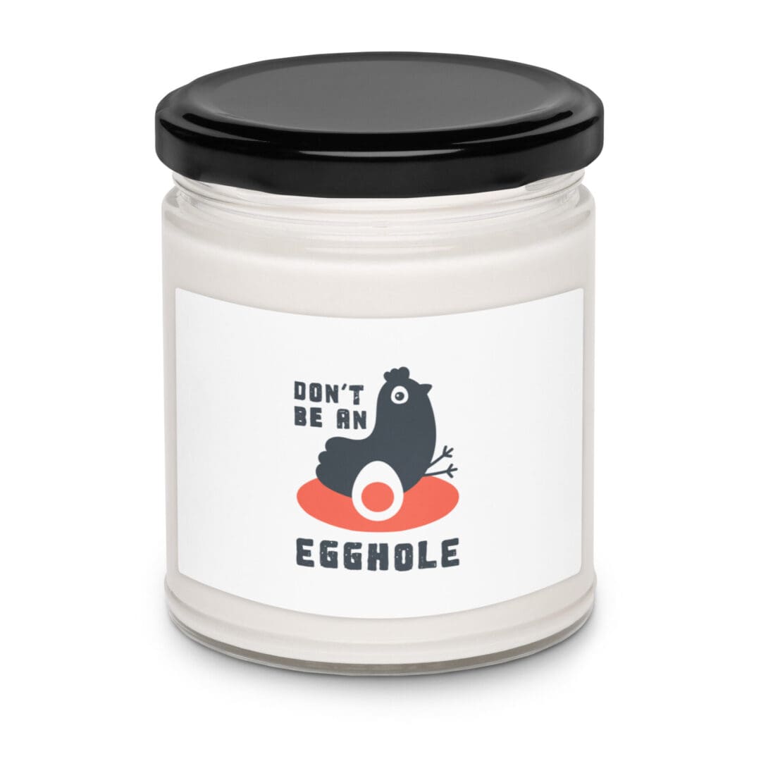White jar with black lid labeled "Eggsole" featuring a chicken graphic.