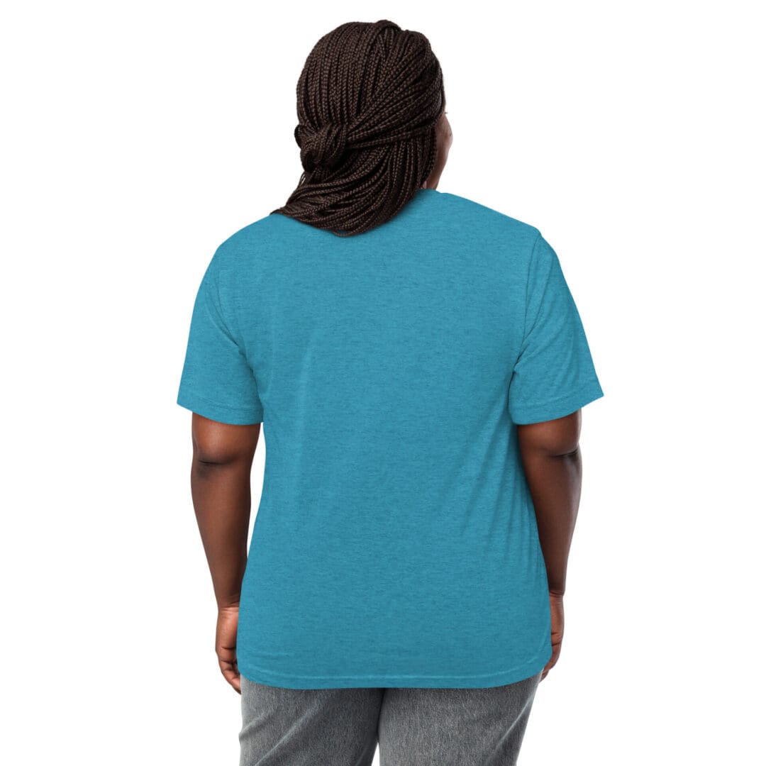 Person wearing a blue t-shirt and gray pants, viewed from the back.
