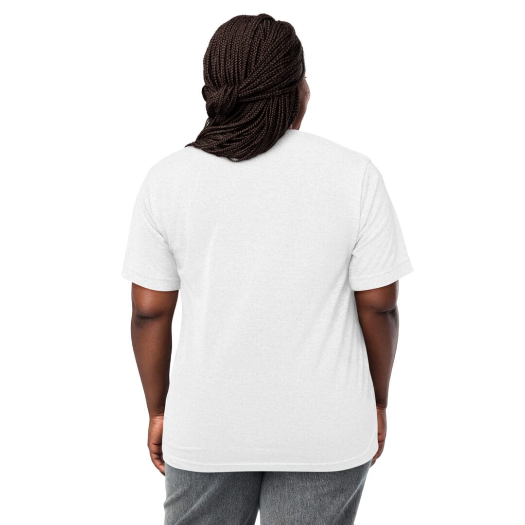 Back view of a person wearing a plain white t-shirt and gray pants.