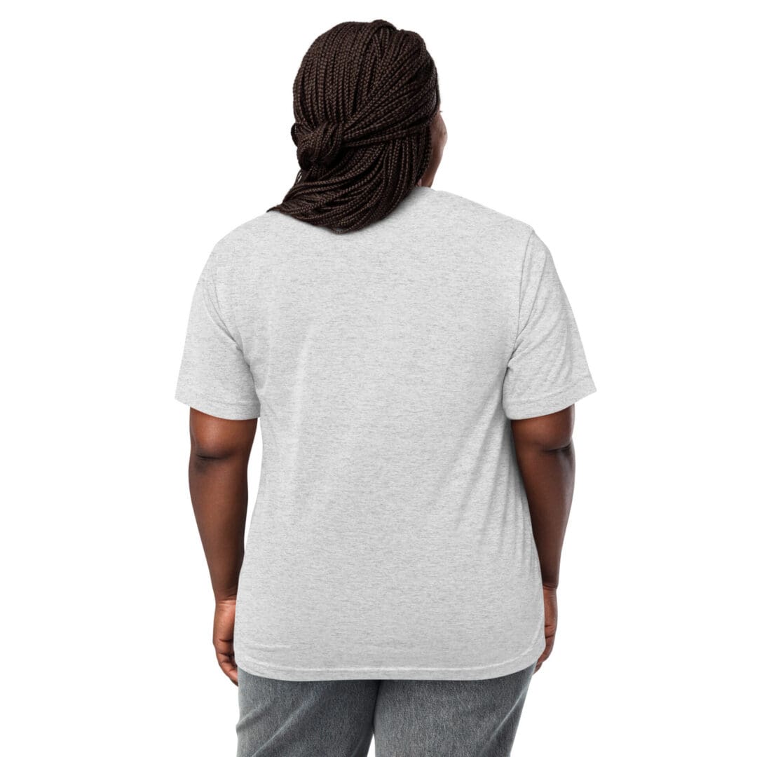 Person with braided hair wearing a plain white t-shirt, viewed from behind.